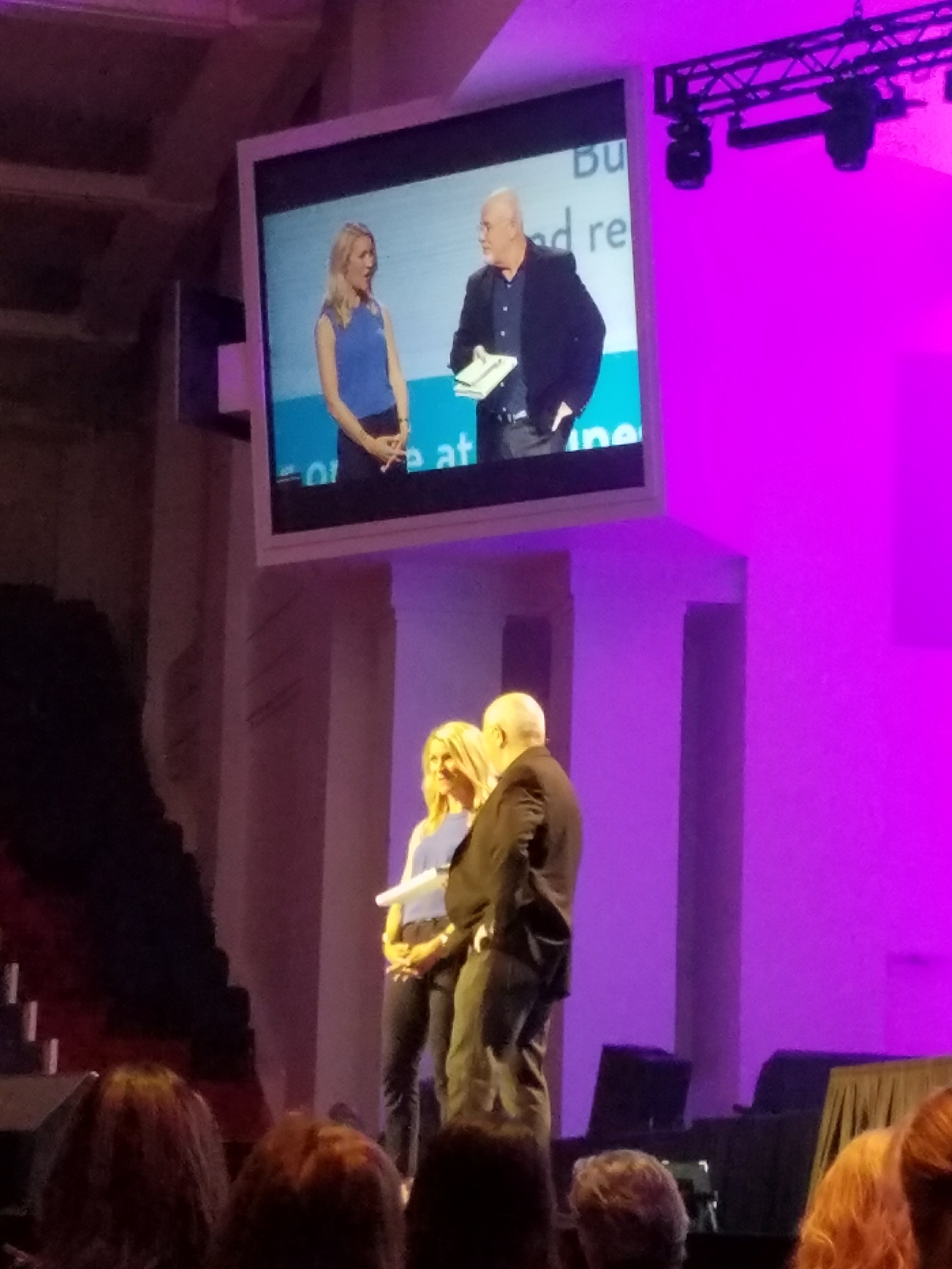 Christy Wright and Dave Ramsey on stage at a Business Boutique Event