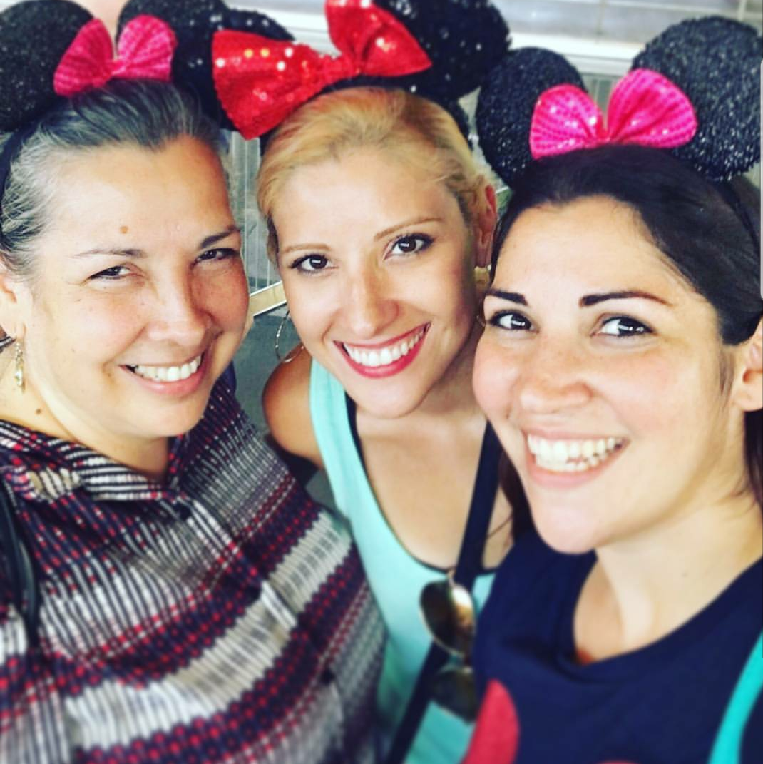 Coppelia with her mom, Camille and sister Emille, waiting for the monorail at the Walt Disney World parks and resorts!