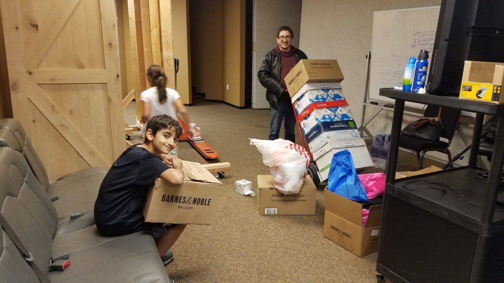 My kids and Steven Kay, grabbing all the boxes for Puerto Rico! My kids and Steven Kay, grabbing all the boxes for Puerto Rico!
