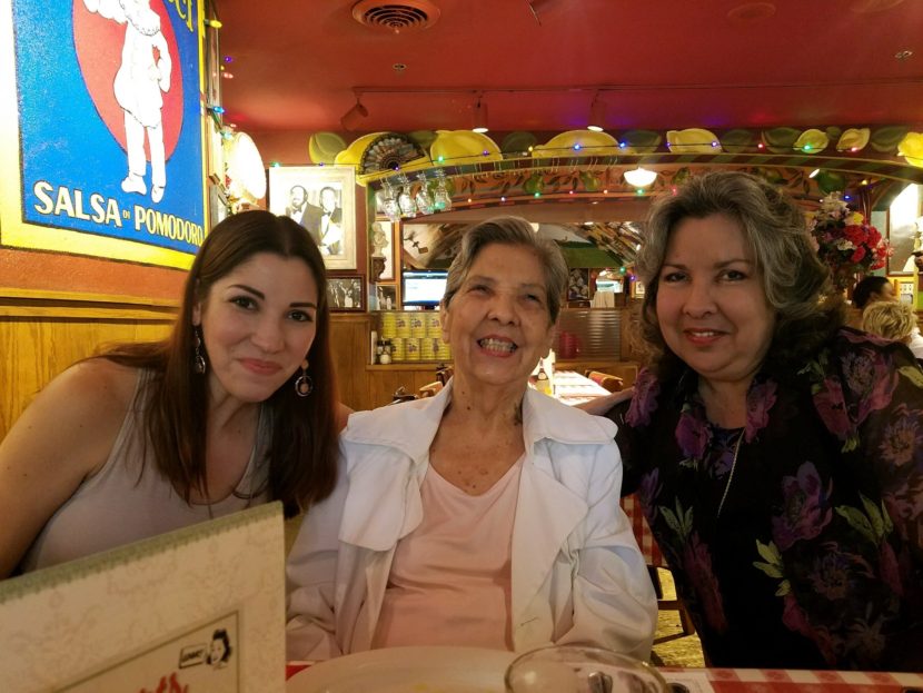 Three generations, a daughter, grandma and mom, enjoying lunch at a restaurant.