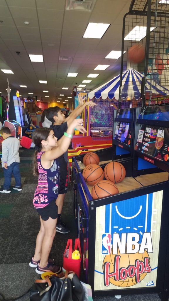 Chuck E Cheese kids playing NBA Hoops