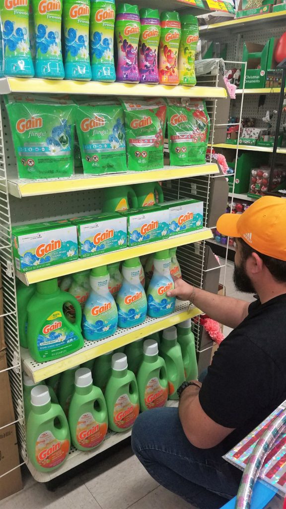 Awesome husband helping find Gain Fresh Water Sparkle at Dollar General