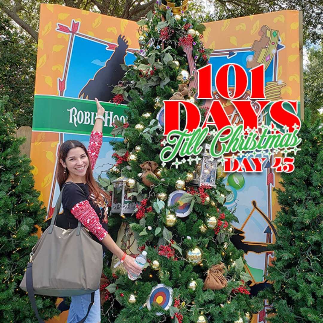 Christmas Tree at Disney Springs! Mom is excitedly showing off the Robin Hood Christmas Tree