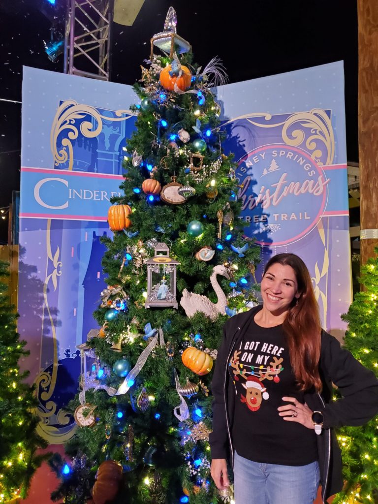 Mom in front of Cinderella Tree at Disney Springs Trail of Trees